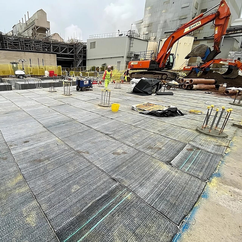 ActiTex Bentonite Membrane laid out for waterproofing at a construction site