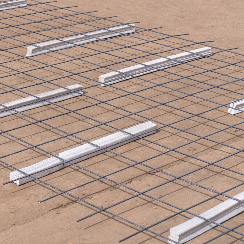 Close view of Concrete Square Bar Spacers used for optimal mesh and cage positioning within concrete slabs