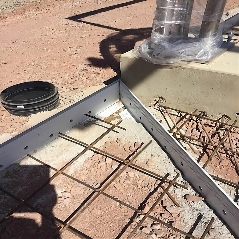 Close-up of K-Form screed rail shaping a drainage channel in concrete