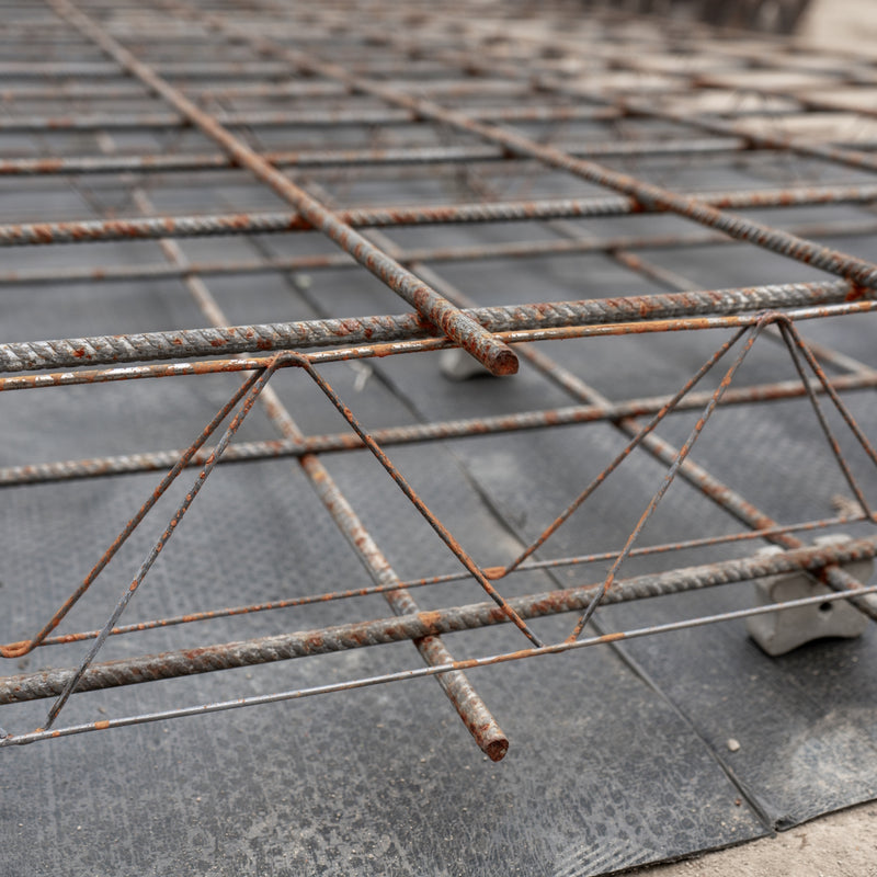 Close-up photo of lattice-type-continuous-high-chairs in action, showcasing their application in reinforcement.