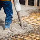 Concrete line pump in action, efficiently delivering concrete to a narrow site.