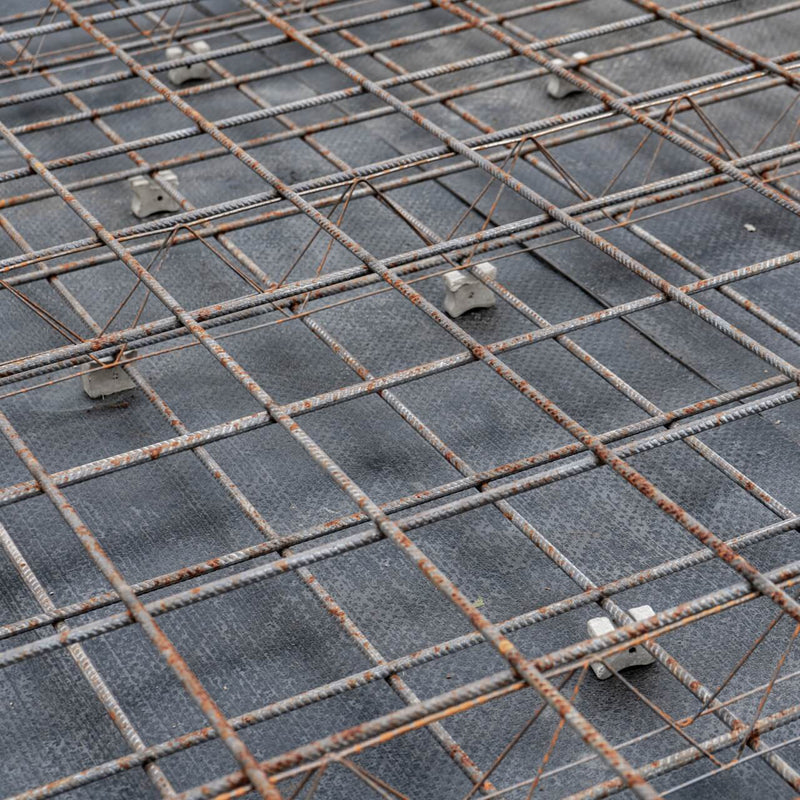 Sturdy triple cover spacers for concrete reinforcement, ensuring robust construction support