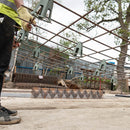 Plastic mesh spacers attached to a mesh sheet, allowing easy movement during construction