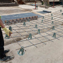Worker positioning reinforcement mesh with attached plastic spacers for easy handling
