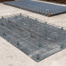 Installation of Snake Spacers on a construction site, demonstrating effective mesh reinforcement.